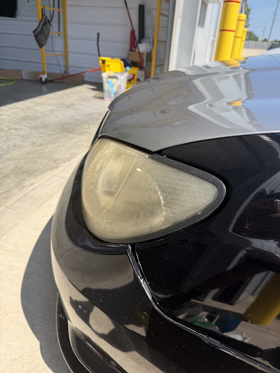 Heavily yellowed and oxidized headlight lens before restoration